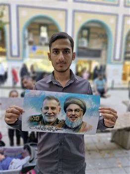 گزارش تصویری: عکس یادگاری با عنوان حزب الله زنده است